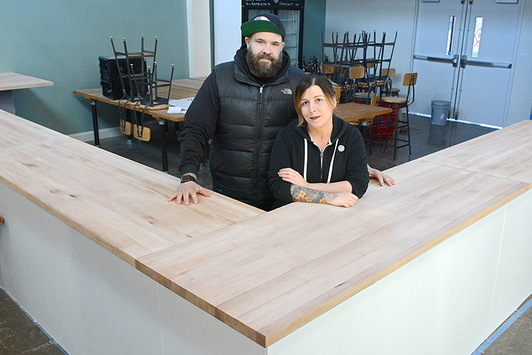 RJ and Lindsey Marvin, owners of Barrel + Brine, stand in their soon-to-be-completed dining area at 155 Chandler St., in Buffalo, N.Y.
