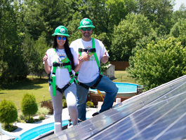 Alicia Uebelhoer and Tyler Uebelhoer of Buffalo Solar Solutions at work.