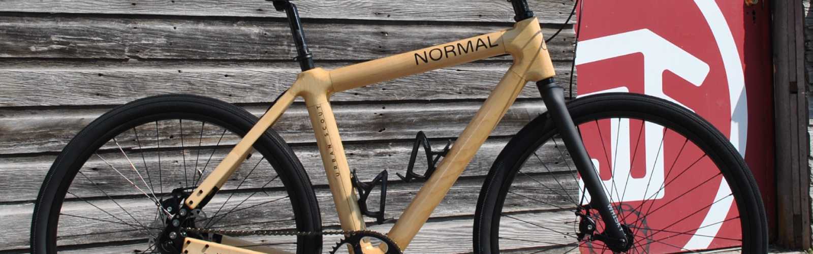 Normal Bicycles are constructed from multiple layers of glued wood veneer, creating a wood composite as strong as fiber or steel.