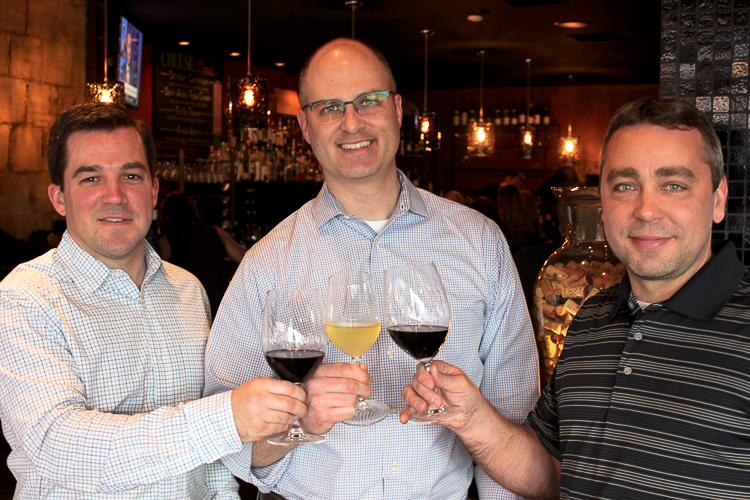OpenBottle founders Dan Roycroft and Scott Steffan and technical director Ryan Rosiek toast to a successful tasting.