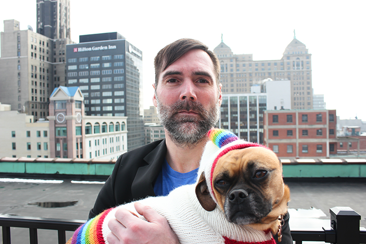 Michael Hamilton, CEO of Peeva, with its namesake dog.  