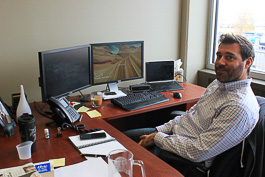 Adam Stotz at his desk in Trove Predictive Data Science.