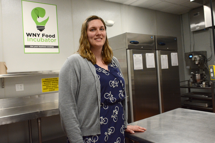 Amanda Henning, agriculture and food systems educator for the Cornell Cooperative Extension, stands in the WNY Food Incubator kitchen in Lockport, N.Y.