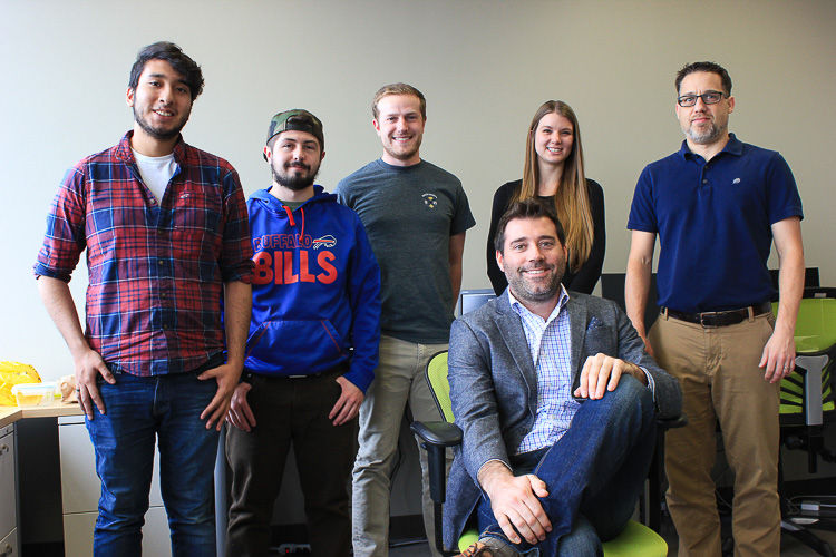 Adam Stotz, founder of Trove Predictive Data Science, and his team at the office.