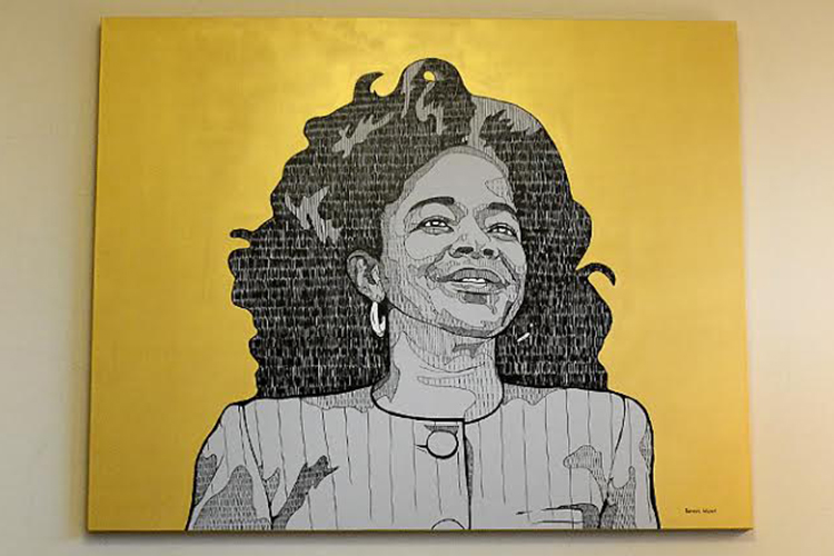 A portrait of Beverly Gray hangs on the wall near the main entrance of the Business Exchange Center that bears her name. 