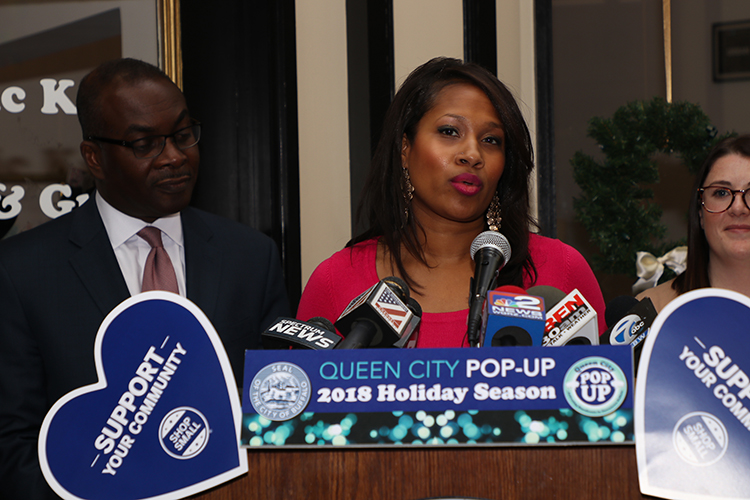 Brandye Merriweather, vice president of the Buffalo Urban Development Corp., announces the Queen City Pop Up's holiday cycle of retailers. 