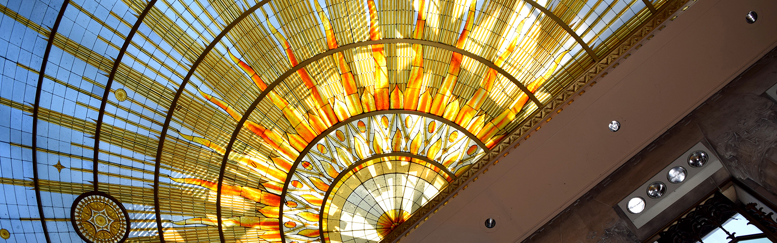 Buffalo City Hall’s Common Council Chamber features a stained glass sunburst ceiling that was inspired by Iroquois art.