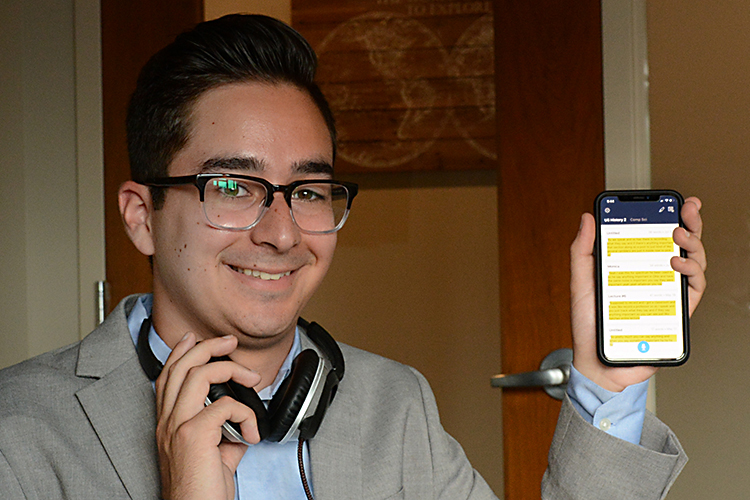 Arthur De Araujo shows off his award-winning app, Lecture Buddy, that converts recorded audio into text.