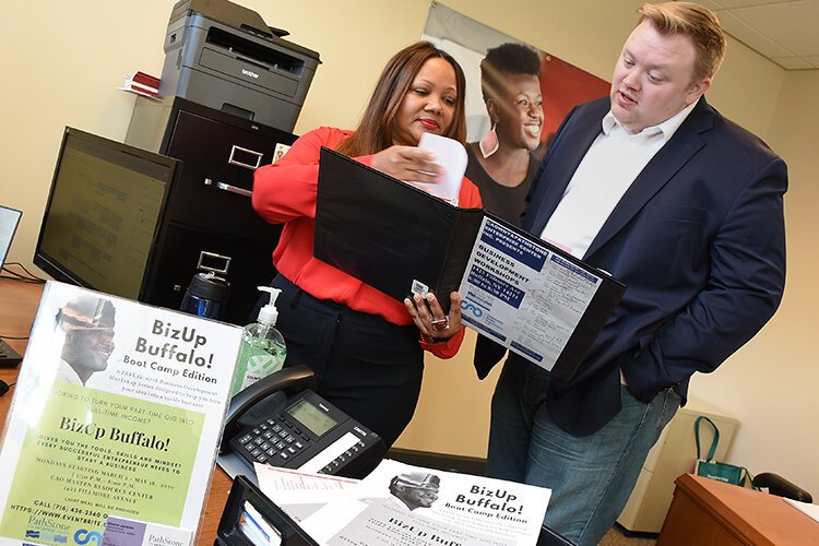 Dionne Jacques and Adam Tidrow at PathStone Enterprise Center office in Buffalo.