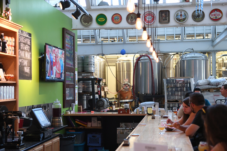 The Resurgence Brewing Company bar with brewing visible off to one side.