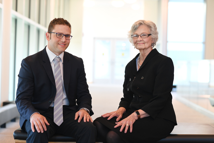 Dr. Steven Buslovich and collaborator Margaret Sayers, GNP, photographed at the Bioinformatics Building, located on Buffalo's medical campus 