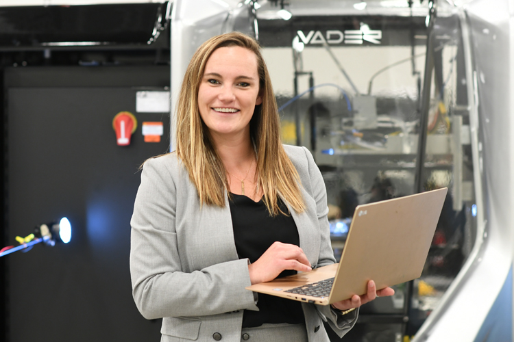 Jennae Pitts, mid-workday, at Vader Systems