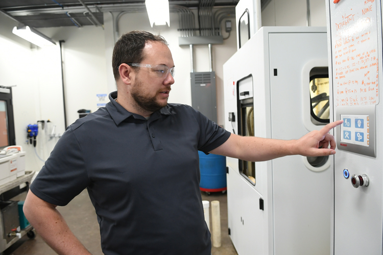 PostProcess Founder and CTO Daniel Hutchinson demonstrates one of his automated post-processing machines