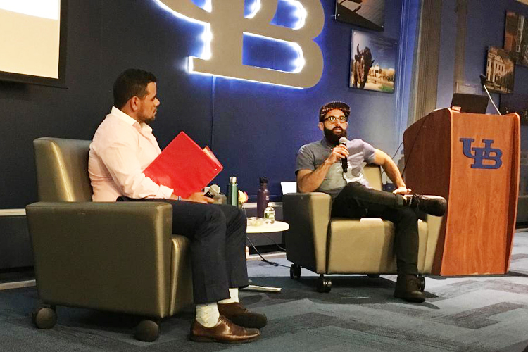 Pete Cimino, right, co-founder of Lloyd's Taco trucks and factory addresses "How I Built This" attendees during the inaugural UB Entrepreneurs Festival. Moderater Matt Rivera is seen at left. 