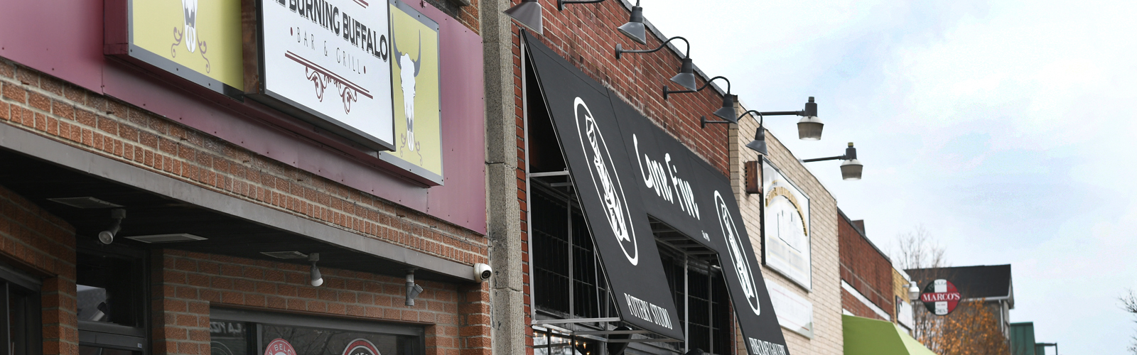 The Burning Buffalo Bar & Grill and nearby Hertel Avenue businesses