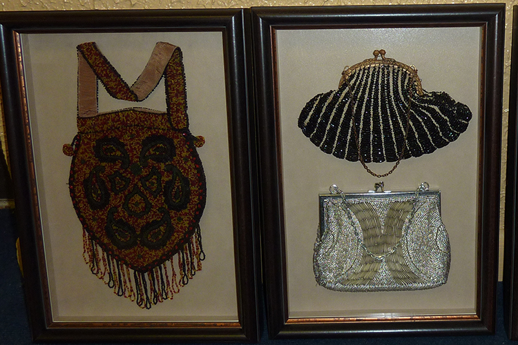 Purses on display, courtesy of Picture Your Walls, a custom frame shop, art gallery, and wholesale and commercial supplier of art and art supplies in Hamburg, N.Y.