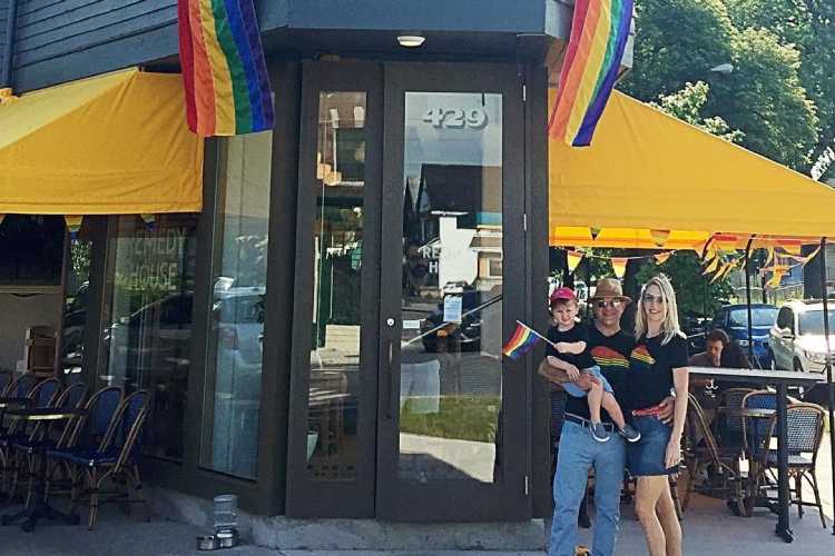 Sarah Griffin-DiVincenzo and her family outside her Five Points business.