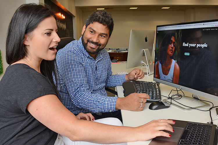 RepHike CEO Shashank Roy and COO Olivia Goldstein work at their Cayuga Drive headquarters.