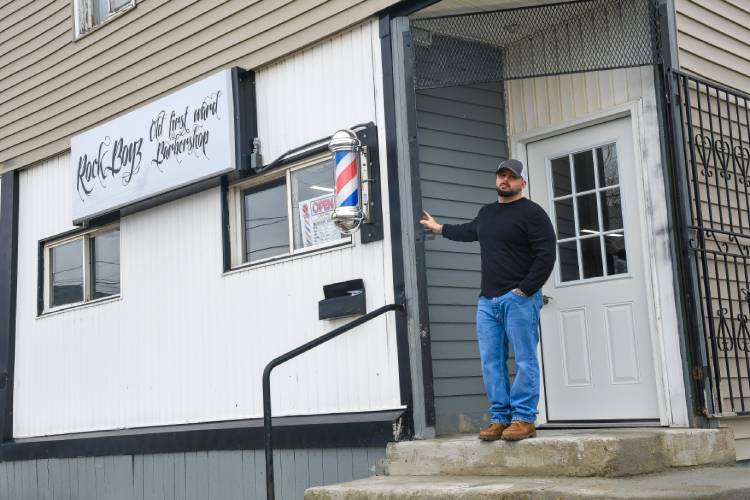 Rocklin stands outside of his shop, located on the corner of Hamburg Street and O'Connell Avenue. The shop opened in December 2018.