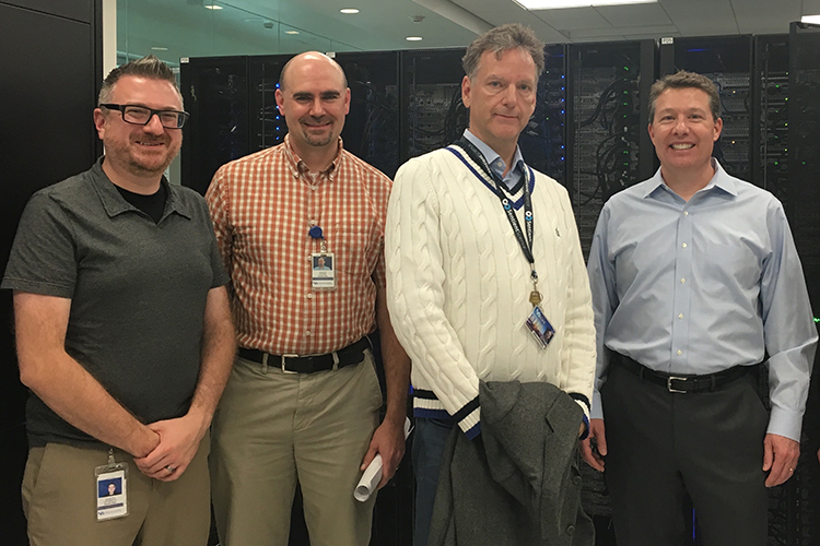 Dr. Matthew Jones and Dr. Shawn Mattott of the UB Center for Computational Research, with Sentient Science’s CEO, Ward Thomas, and CFO, Brendan Harrington.