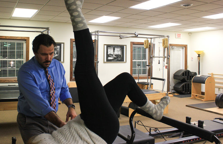 Dr. Shawn Riester demonstrates his technique in physical training.