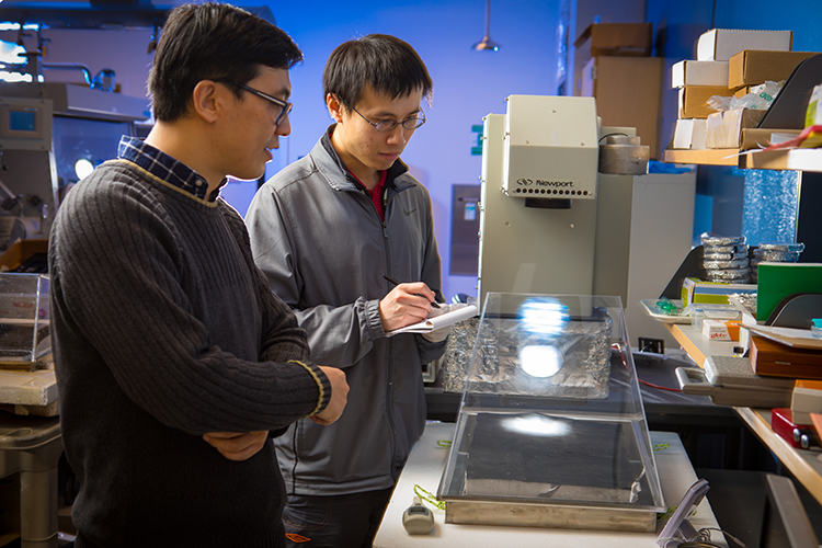 Sunny Clean Water co-founders Qiaoqiang Gan and Haomin Song in the research lab in UB’s Davis Hall.