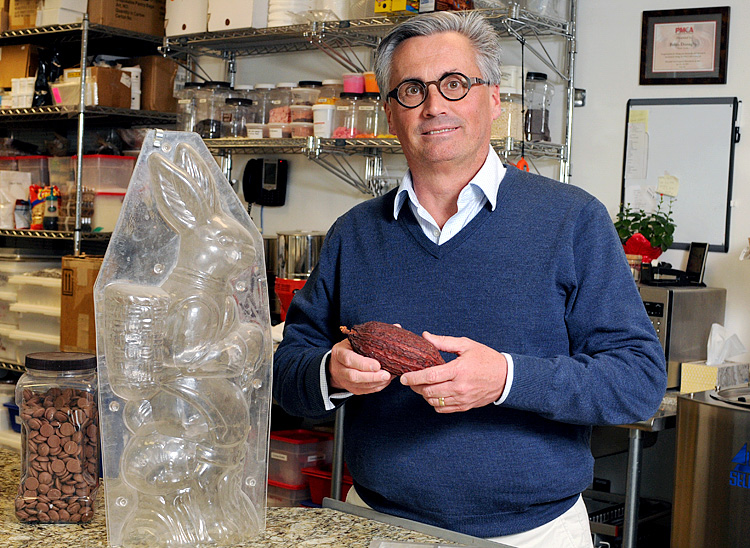 Thomas Elsinghorst, the owner of Tomric Systems, with a cocoa pod.