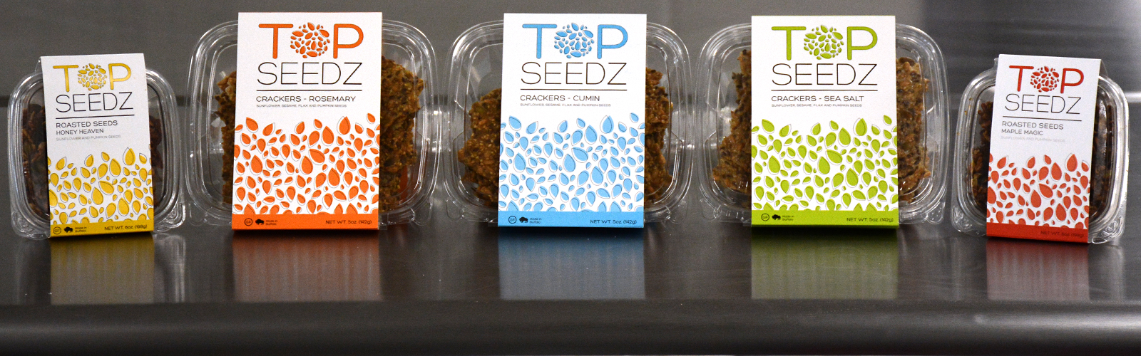 Top Seedz sunflower, sesame, flax, and pumpkin seeds line of health crackers. 