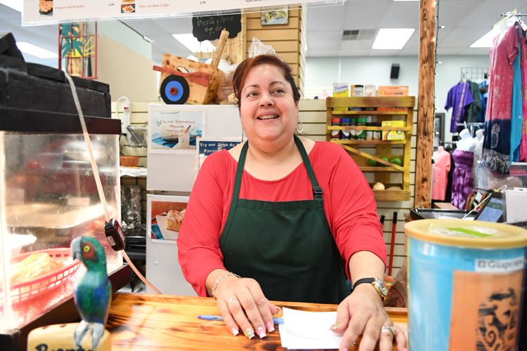 Maria Rodriguez Carmen, proprietor of Kiosko Latino. Photo by Nancy J. Parisi.