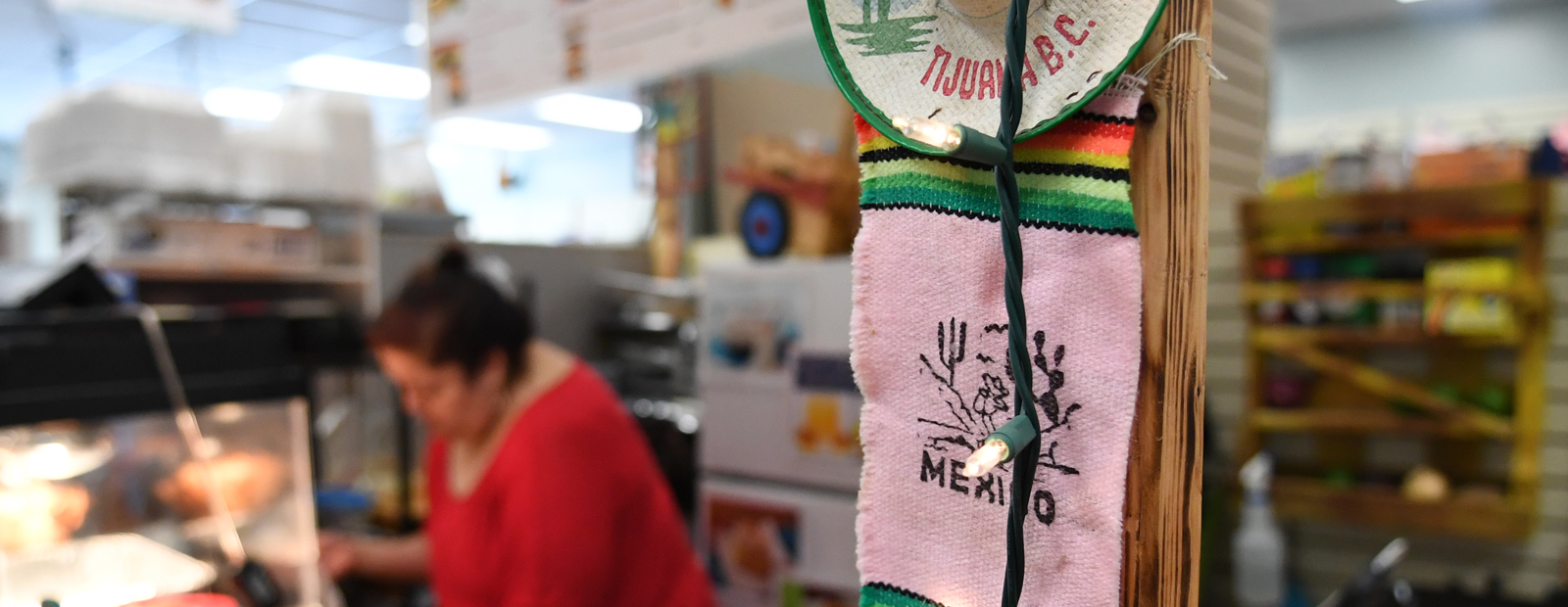 Inside West Side Bazaar cooperative market, in front of Kiosko Latino. 