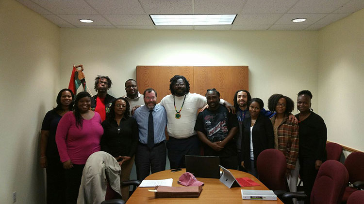 Alexander J. Wright JD (center) with members of the African Heritage Food Co-op. 